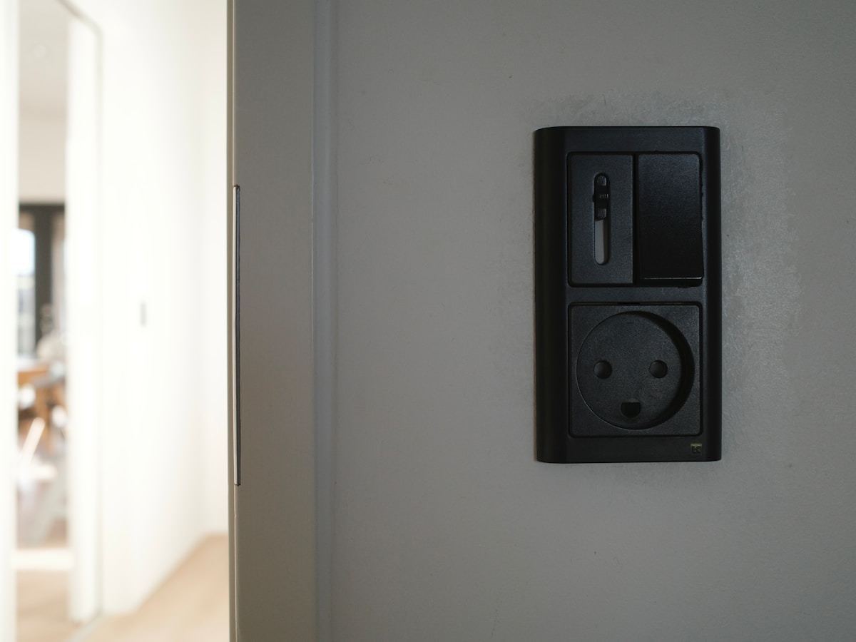 Modern wall switch — the kind a smart switch replaces. The neutral wire requirement is the #1 DIY blocker.